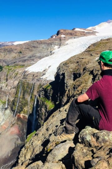 Dan looks at a glacier waterfall called Castaño Overo during the Cerro Tronador hike during a 4 day Bariloche trekking itinerary