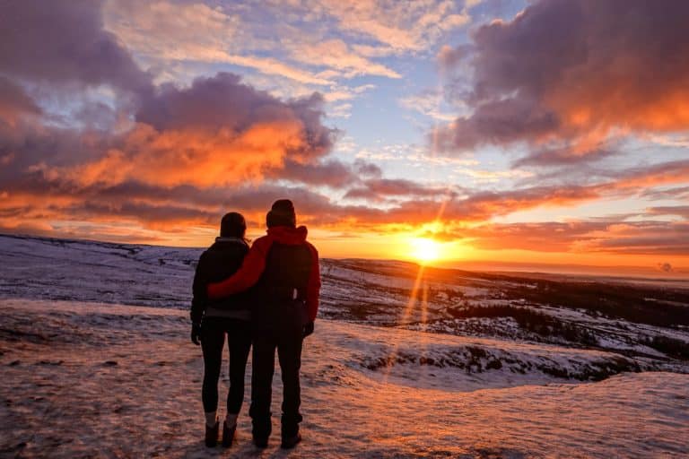 Beck and Dan watch sunrise on the Rivington Pike Walk, starting from Rivington Hall Barn