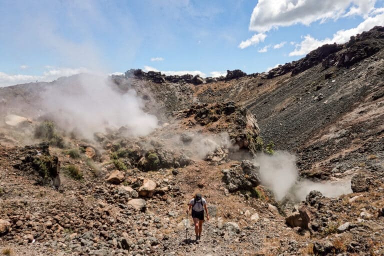 Beck hikes among steaming rocks at the top of the Izalco Volcano hike
