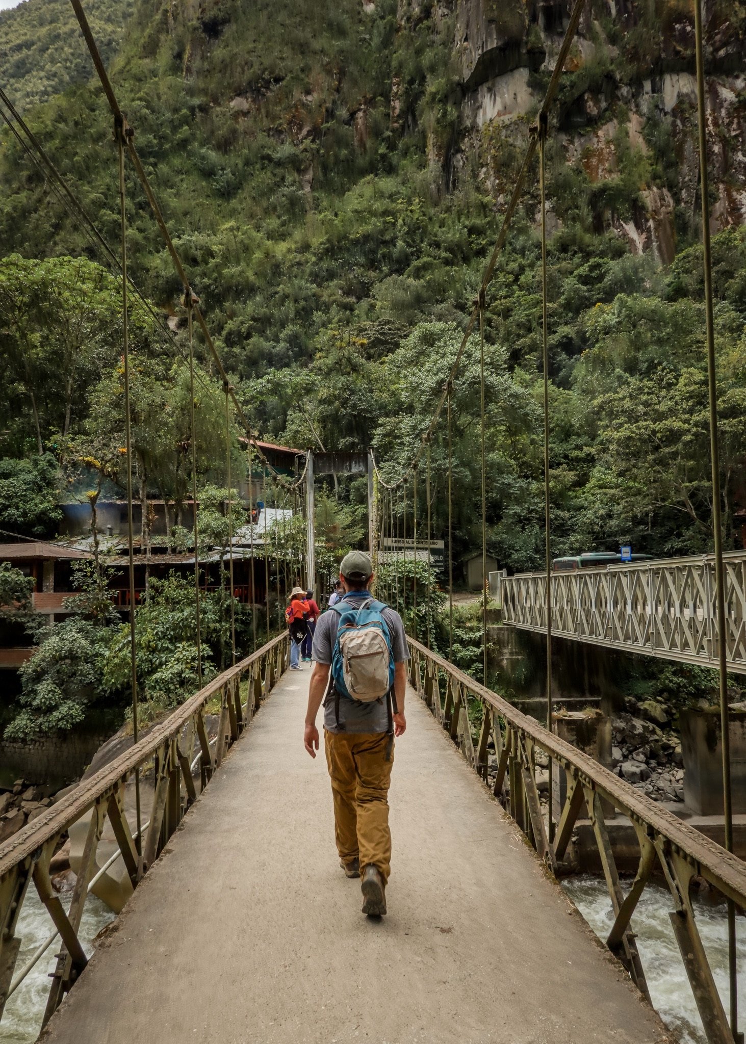 Dan crosses a bridge towards Aguas Calientes