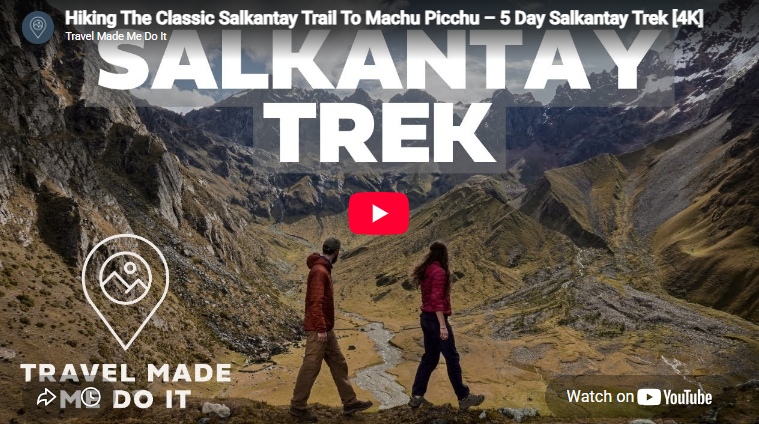 Dan and Beck hiking and looking at a mountainous landscape on the Salkantay Trek