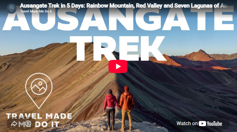 Beck and Dan hold hands looking at Rainbow Mountain during the Ausangate Trek