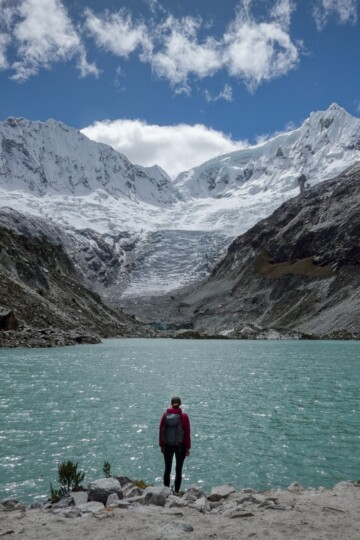 Beck looks at Laguna Llaca, and the Ranrapalca and Ocshapalca mountains, near Huaraz