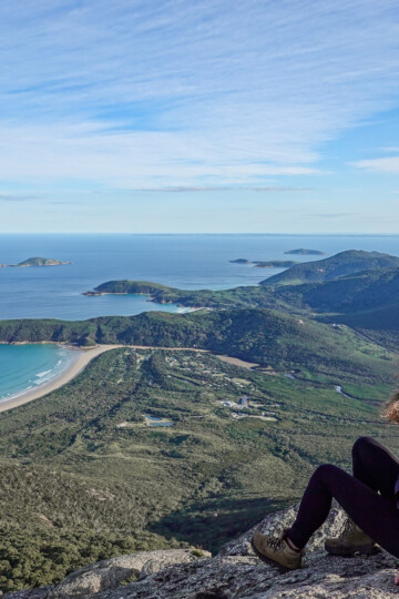 Beck sits at the summit of Mount Oberon in Wilsons Prom