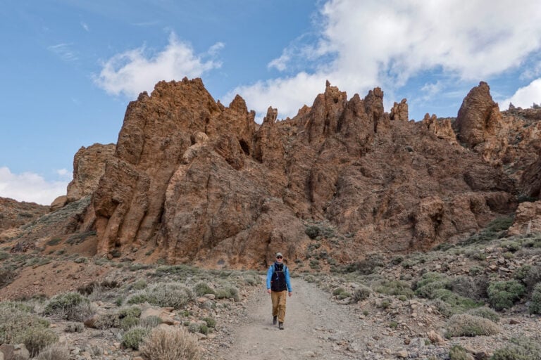 Dan hikes towards the Cañada Blanca Visitor Centre and Parador de Las Cañadas del Teide and away from Mount Guajara during the Alto de Guajara in Tenerife.