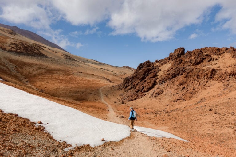 Dan walks in between Montana Rajada and Montana Blanca in Teide National Park, Tenerife.
