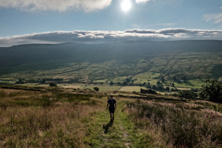 Dan on the Wild Boar Fell Walk with Mallerstang in the background, near Pendragon Castle