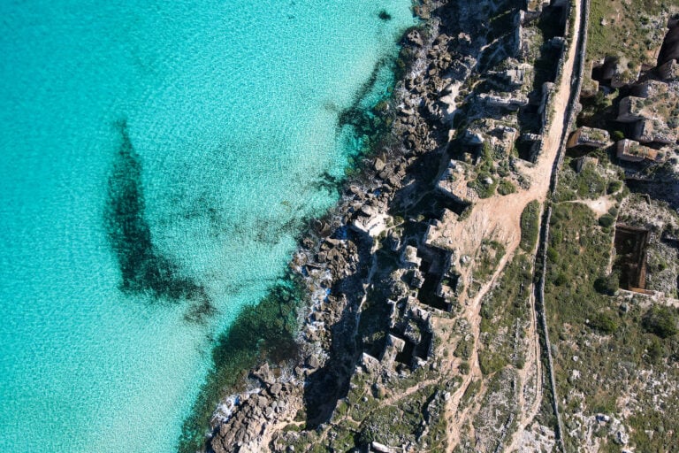 An earial shot of Cala Rossa (AKA Scogliera di Cala Rossa and Spiaggia di Cala Rossa) – an awesome beach in Favignana