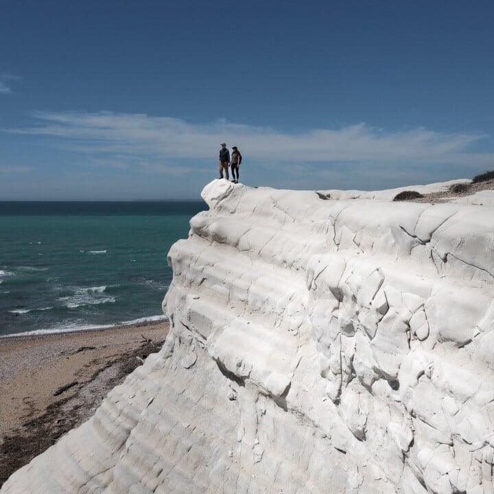 Dan and Beck hiking on Capo Bianco during one of the best hikes in Sicily