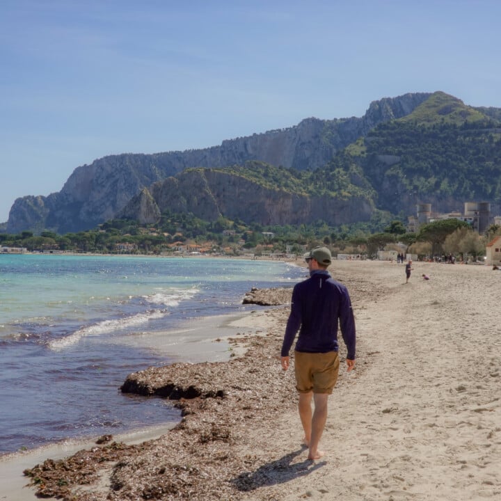 Dan walks on Mondello Beach next to Palermo, near Capo Gallo