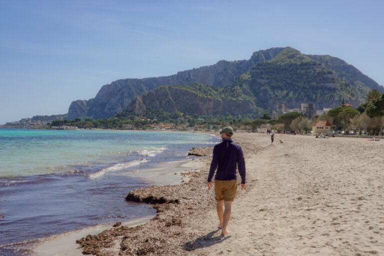 Dan walks on Mondello Beach next to Palermo, near Capo Gallo