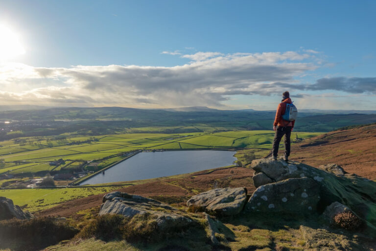 Dan looks at Embsay Reservoir from Embsay Crag