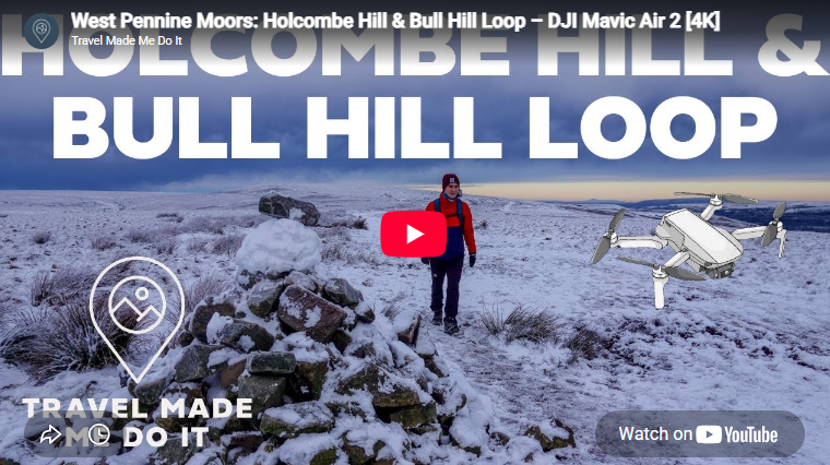 Dan walking in snowy conditions during the Holcombe Hill and Bull Hill Walk