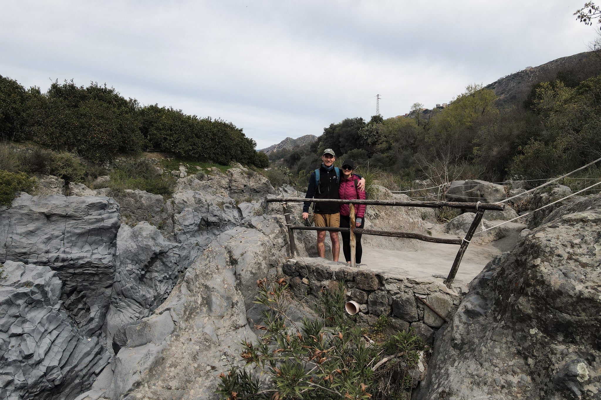 Dan and Beck stand together in the Gole Alcantara Botanical and Geological Park