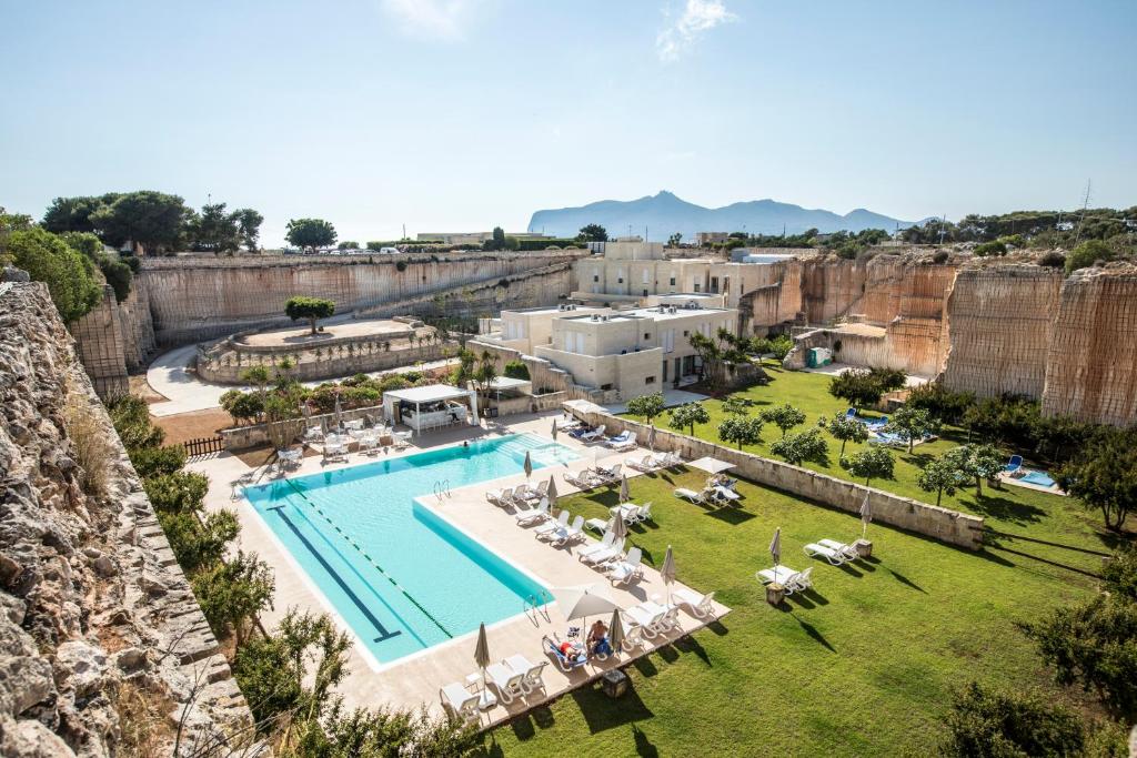 A pool and grounds of a hotel in Favignana