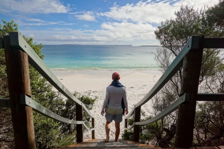 Man walks onto Iluka Beach Jervis Bay