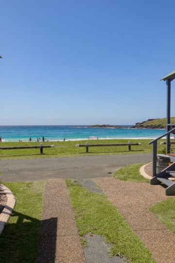 Views of a beach from a holiday park (AKA a caravan park) , in Kiama, which also features campsites