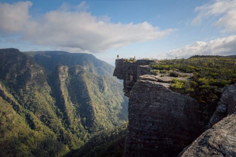 Dan stands on a rocky outcrop along the the Kanangra Walls in Kanangra-Boyd National Park