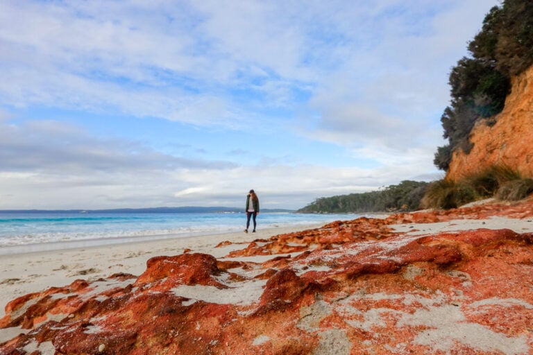 Walking down Nelsons Beach close to camping in Jervis Bay