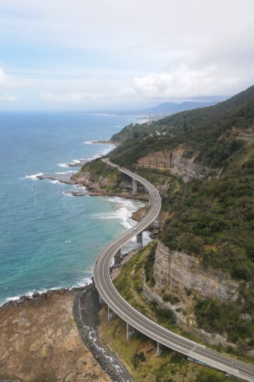 A curved road over the ocean called the Sea Cliff Bridge in Wollongong