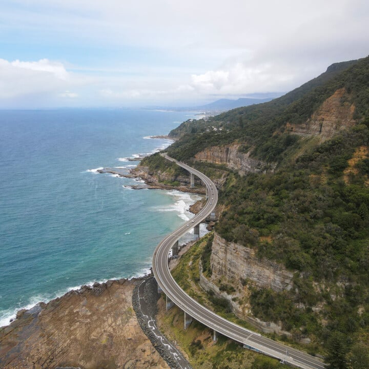 A curved road over the ocean called the Sea Cliff Bridge in Wollongong