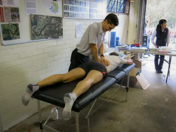 Daniel is mobilizing someone's back as he works as a physiotherapist