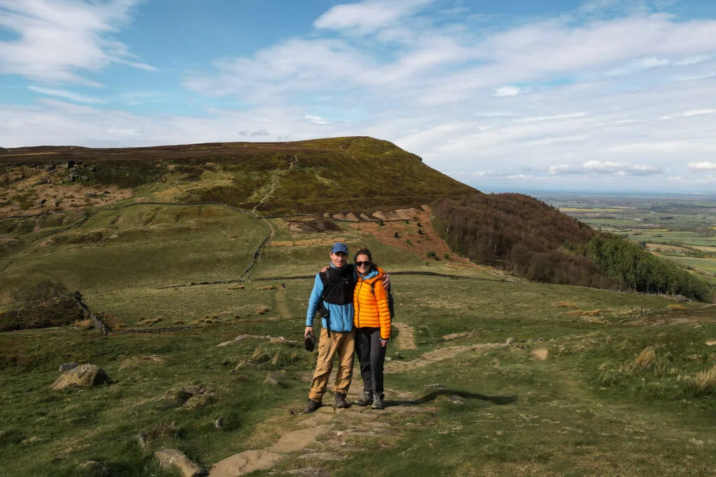 Dan and Beck embrace on the Wainstones Walk from the Lord Stones Country Park