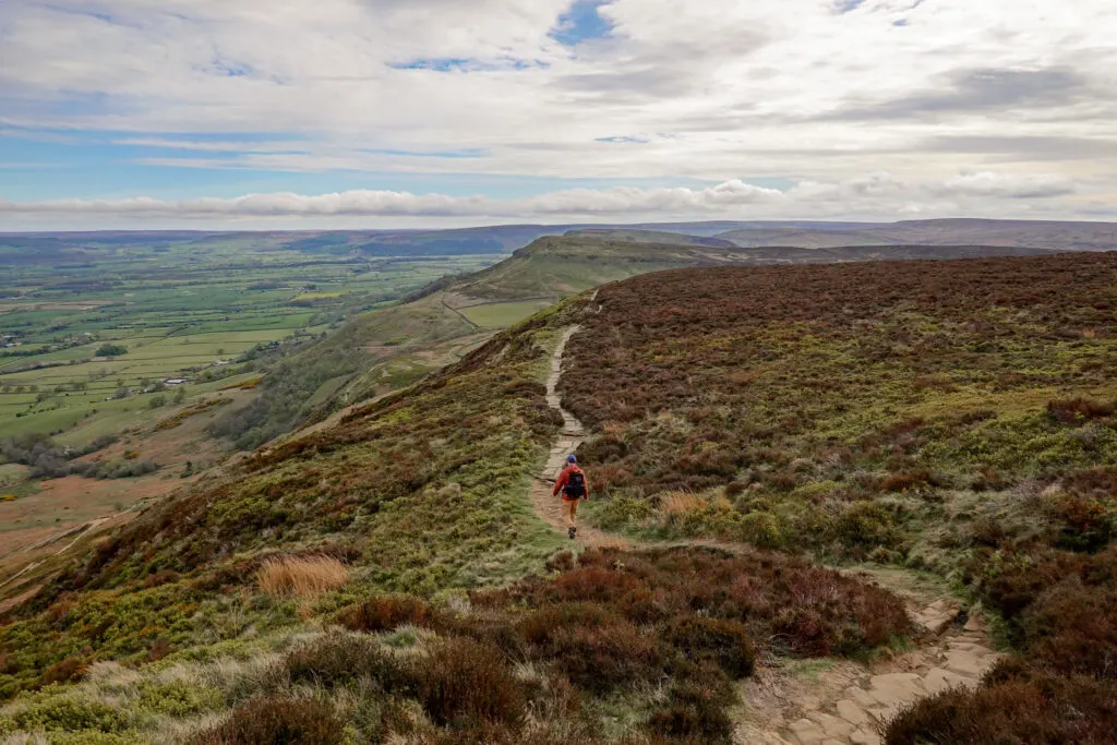 Dan descends a trail in the Lord Stones Country Park towards the Wainstones