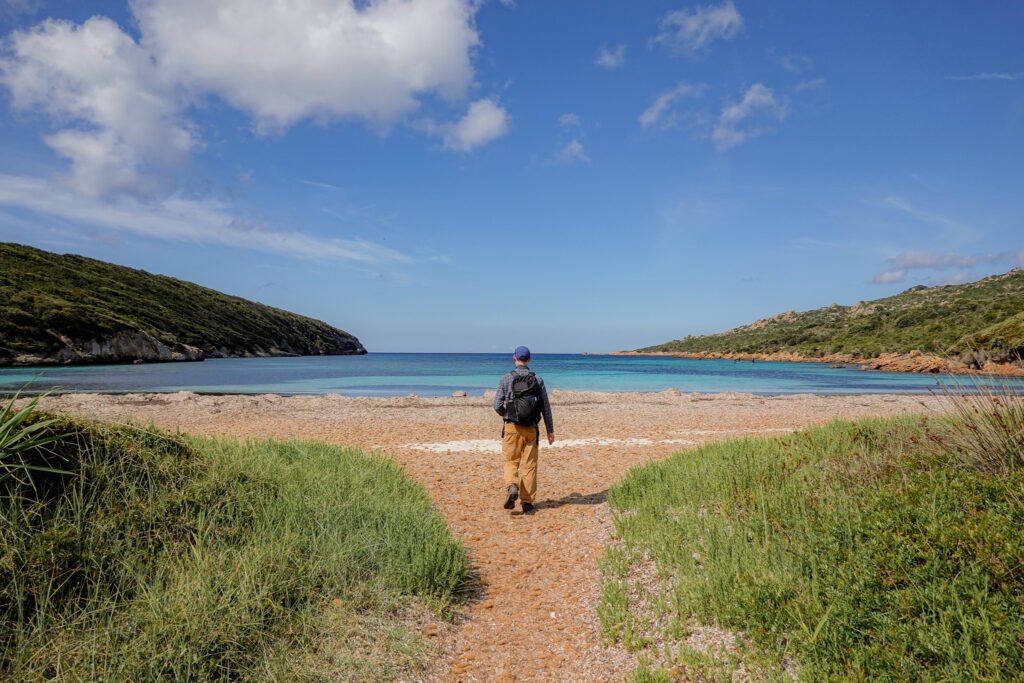 Dan walks on a beach during a walk called Strada Vecia Madonetta