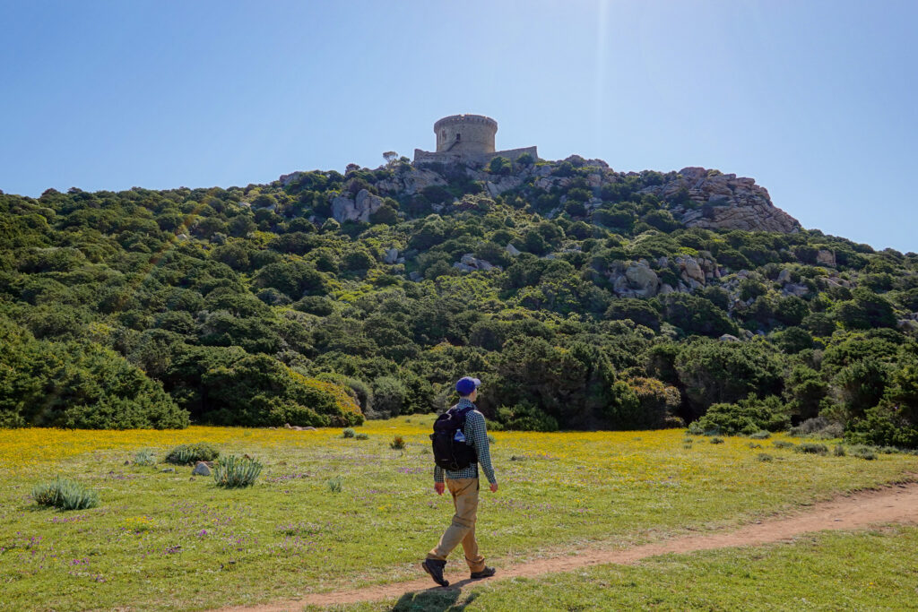 Dan walks on a dirt trail in Corsica called Sentier du littoral de Campomoro