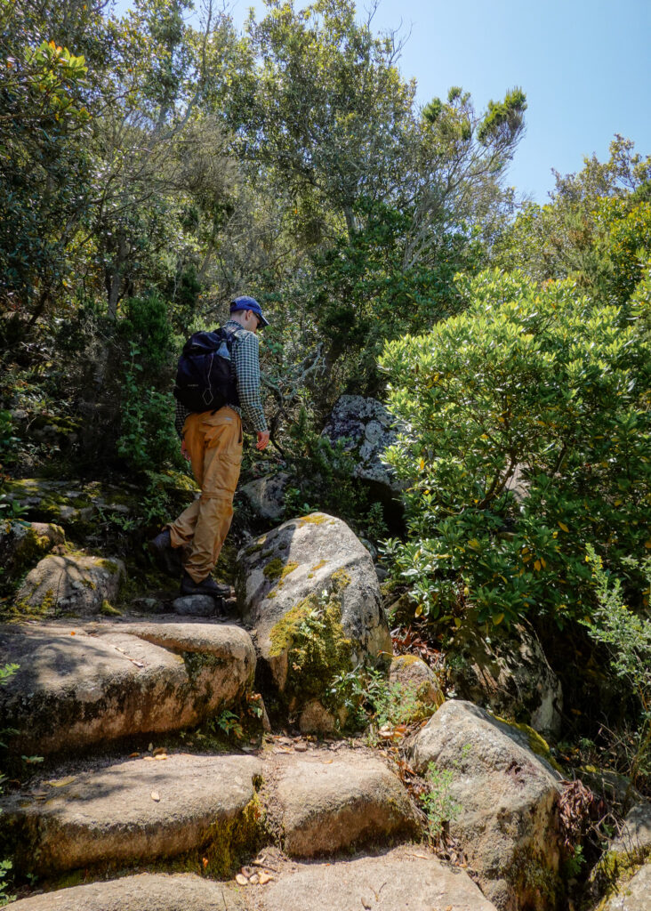 Dan ascends a steep trail on Capu di Muru