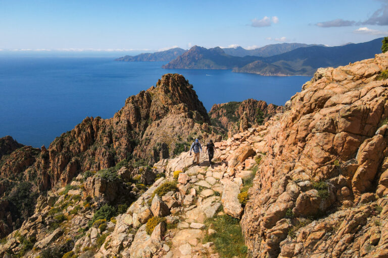Dan and Beck walk along Sentier Muletier during the Calanques de Piana Hike in Corsica