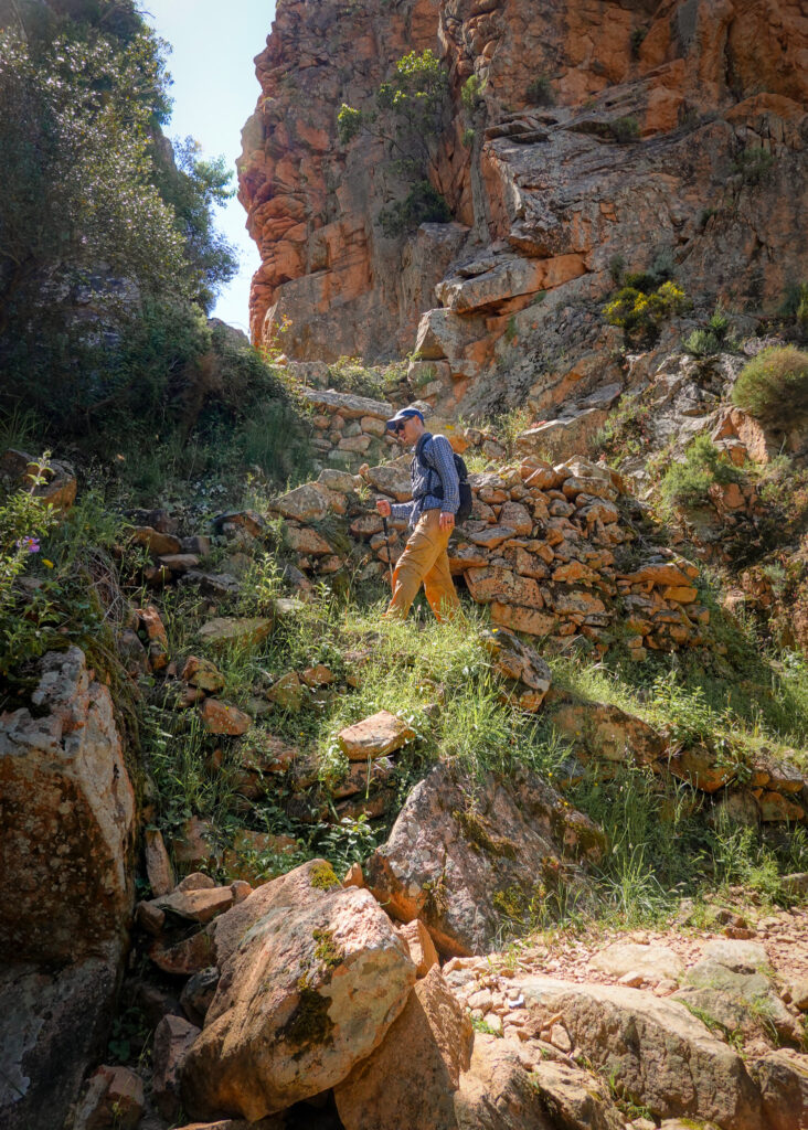 Dan begins the ascent up Sentier Muletier on the Calanques de Piana Hike