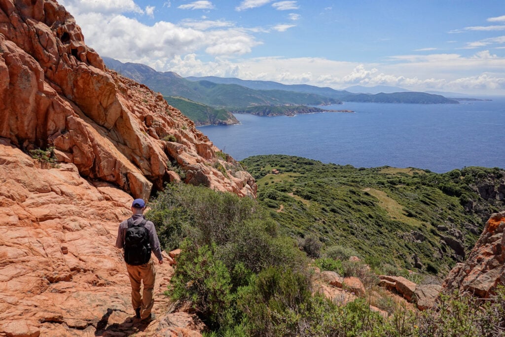 Dan descends a steep section of the Capo Rosso Hiking Trail