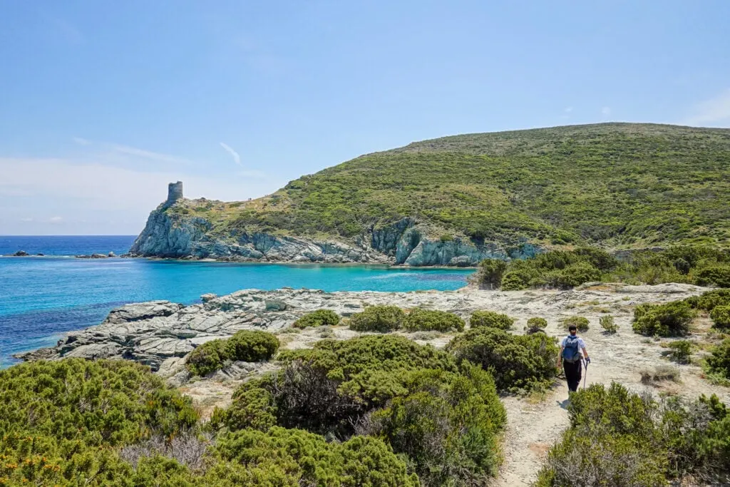 Beck walks on seaside trail called Sentier des Douaniers Cap Corse