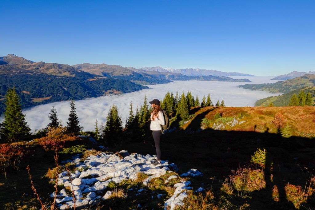 Beck looks over a valley shrouded in cloud during the Madrisa Hike to Ratschenhorn