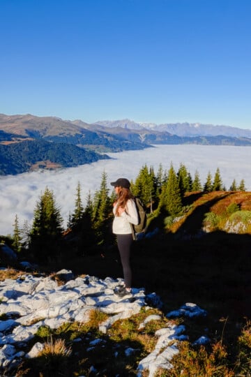 Beck overlooking a cloud inversion during one of the best hikes in the Davos Klosters region