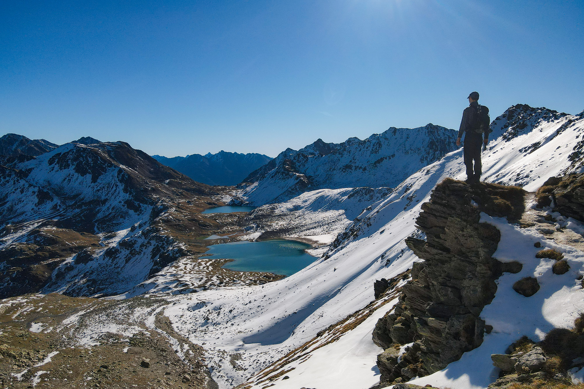 Dan overlooking a group of Alpine lakes during the Joriseen Hike