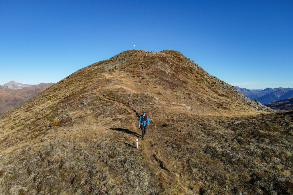 Dan descends a ridge during the Rinerhorn Summit Hike