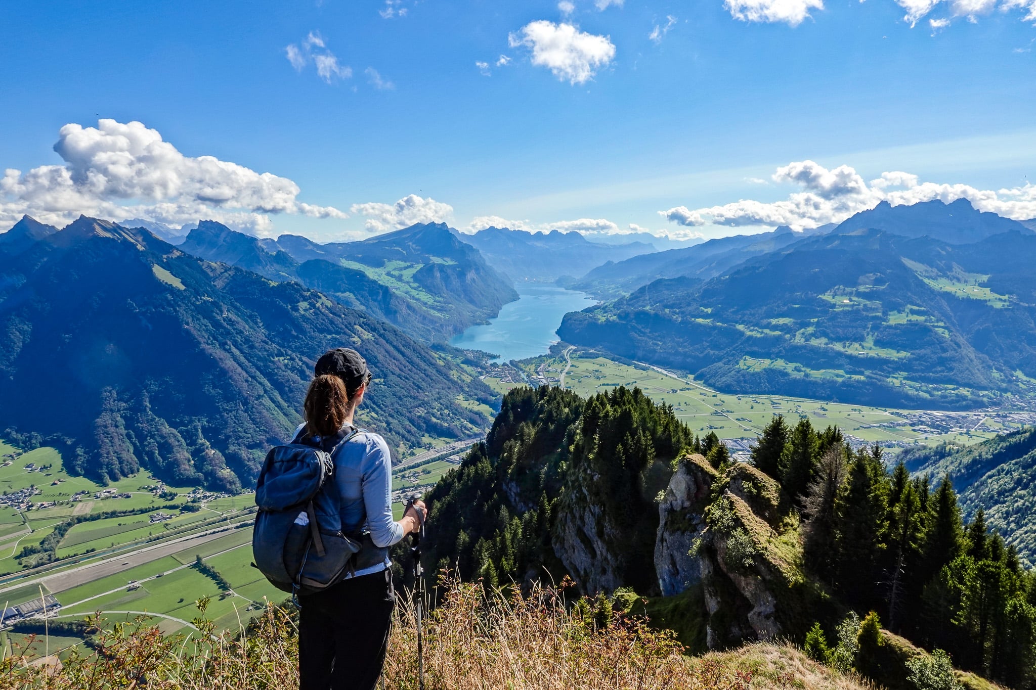 Beck looks towards Lake Walen from the peak of Hirzli during the Hirzli Planggenstock Hike
