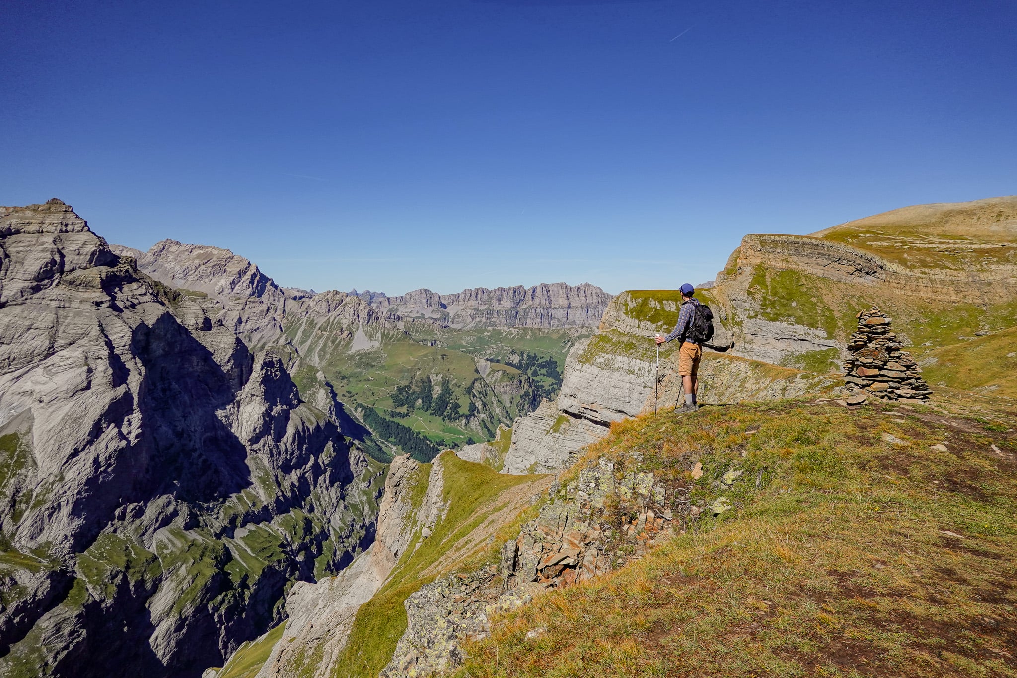 Dan enjoys views of mountains from a peak called Muttenchopf during the Limmernsee Hike