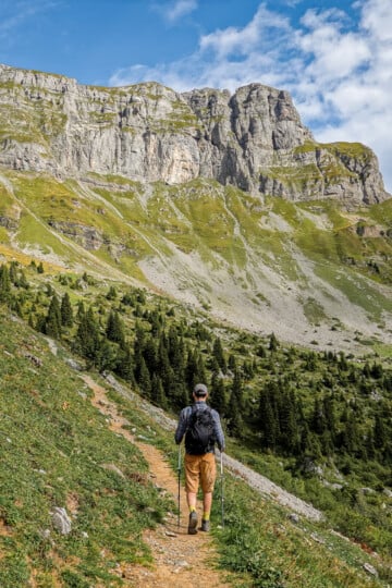 Dan walks amongst mountains during the Braunwald Panoramaweg