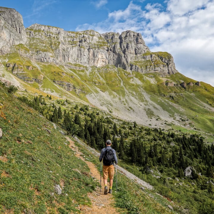 Dan walks amongst mountains during the Braunwald Panoramaweg