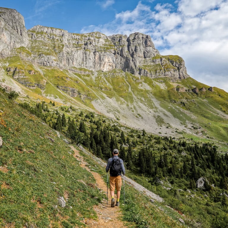 Dan walks amongst mountains during the Braunwald Panoramaweg